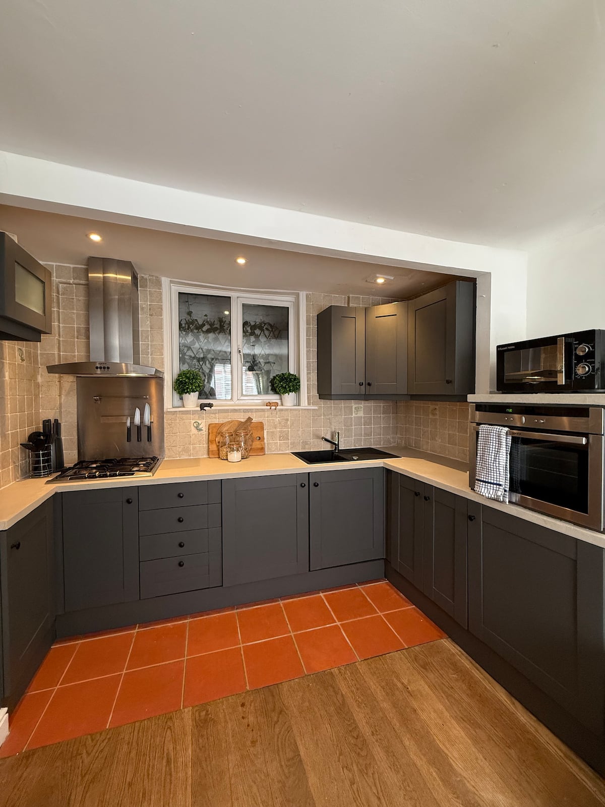 Modern kitchen with grey cabinetry